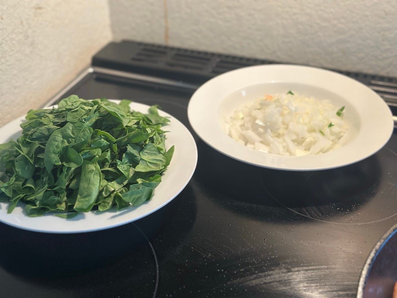 Ingredients prepped for salmon with sun-dried tomatoes and spinach